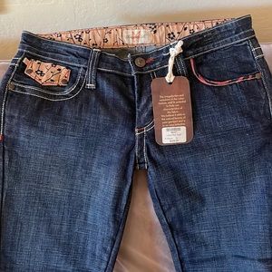 Frankie B low rise boot cut jean. New
